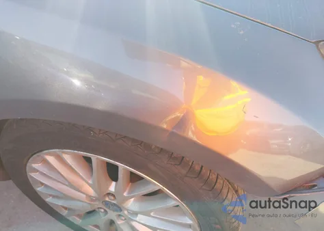 2013 Ford Focus Titanium z USA, uszkodzony, nr VIN 1FADP3N20DL277007